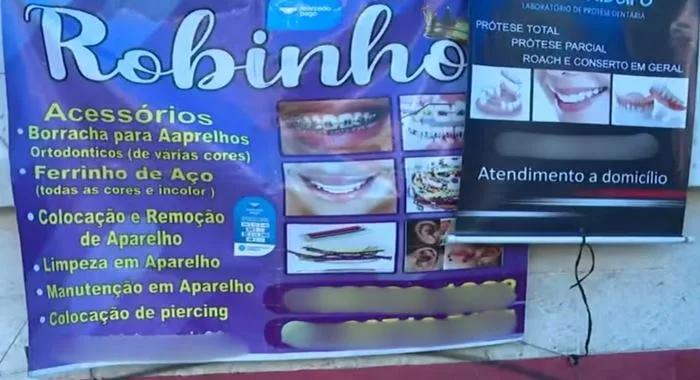 Cartaz que ficava na frente da barraca homem, em Salvador- Foto: Reprodução/TV Bahia